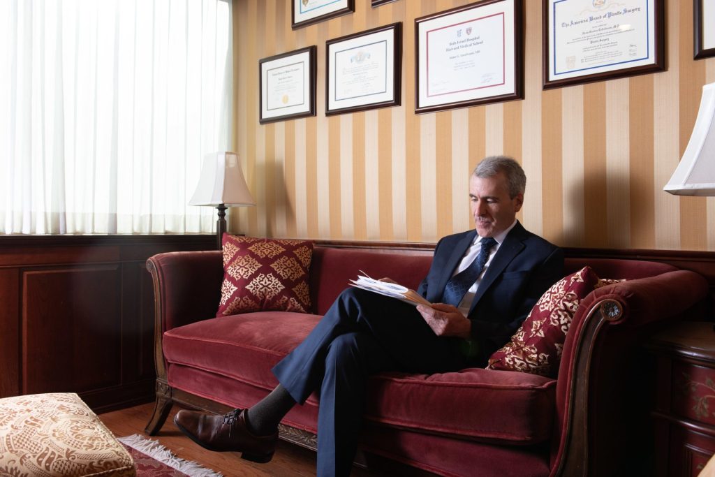 Dr Tattelbaum MD sitting in his office